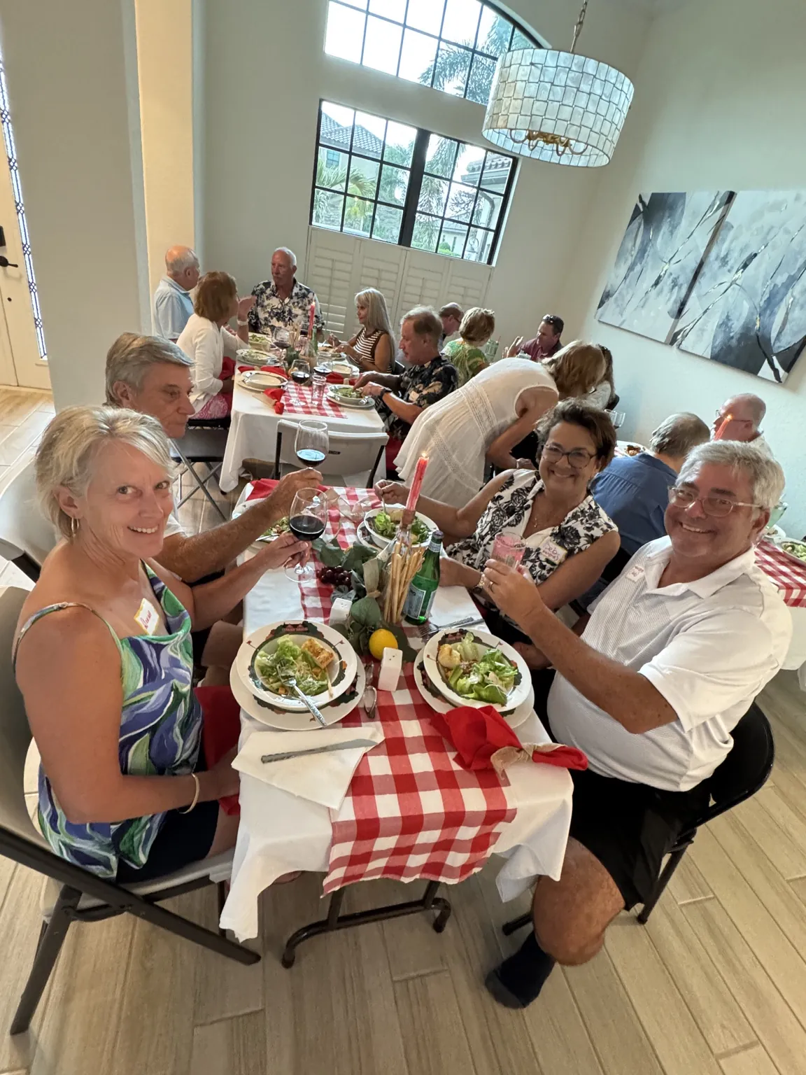 Neighbors enjoying dinner together