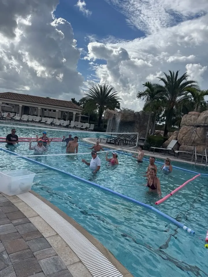 Neighbors playing Pool Volleyball at Lakewood National